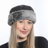 Fascinator hat with synthetic fur band and flip-up ear flaps