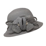 Sewn-in straw cloche hat with jute ornament